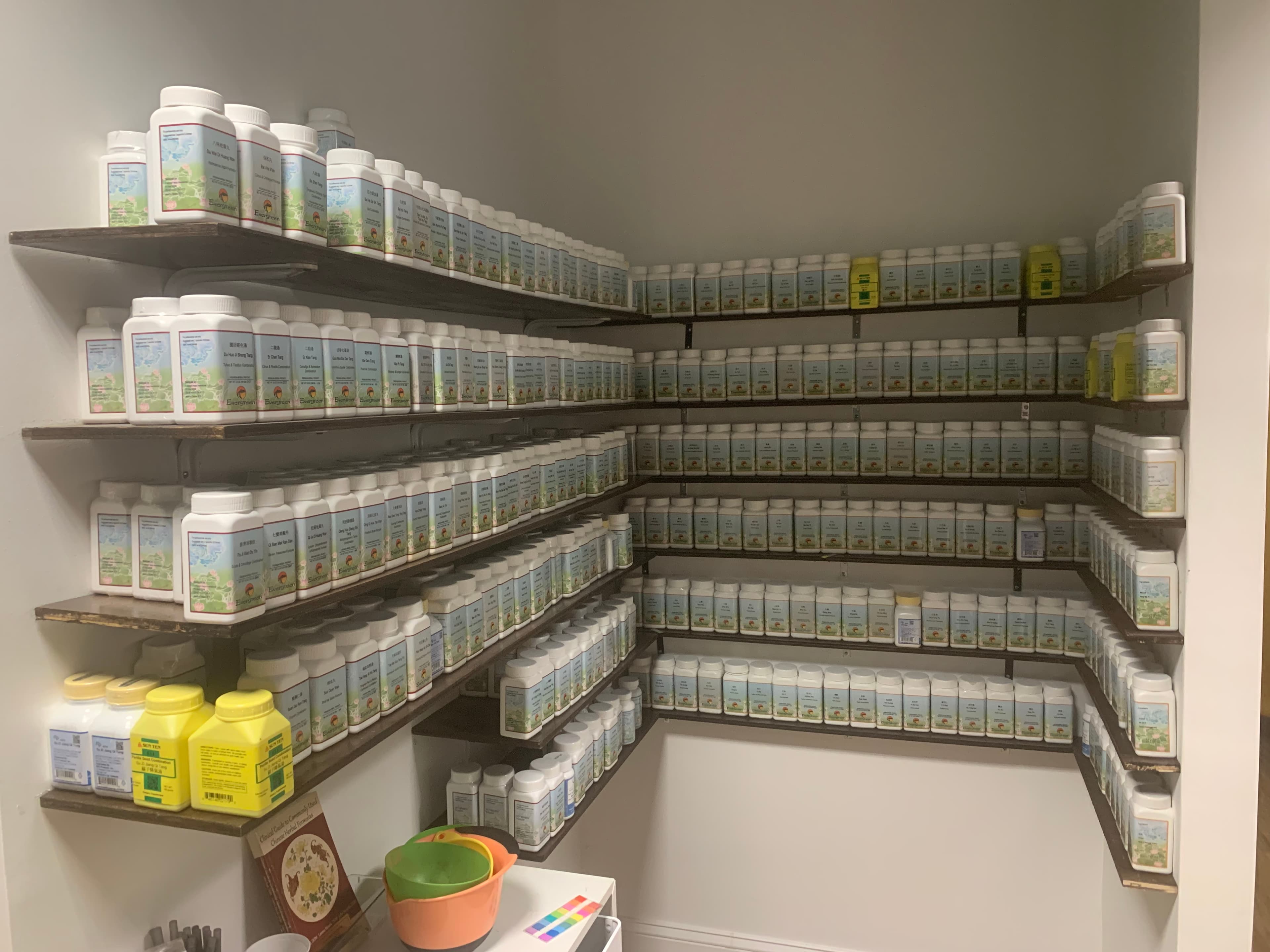 Chinese herbal medicine dispensary at Pulse Community Care — hundreds of custom herbal formulas
